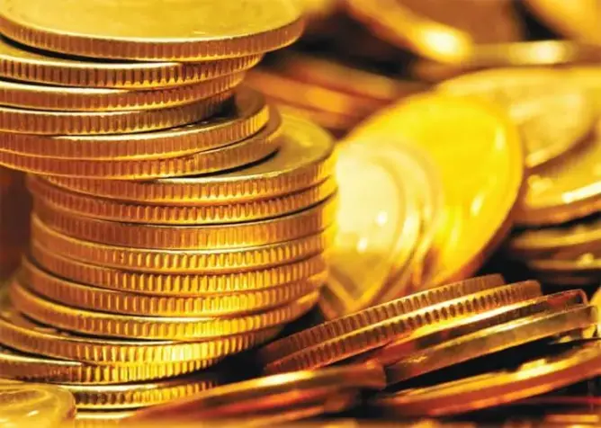 انخفاض طفيف في أسعار الذهب مع صعود الدولار