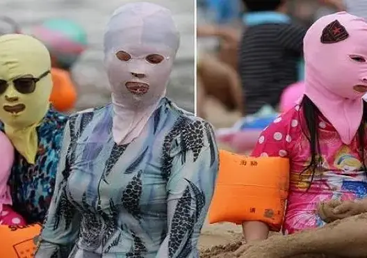 صرعة الفيسكيني (بكيني الوجه) تجتاح شواطئ الصين