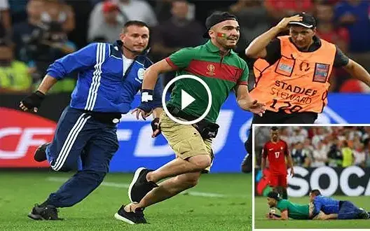 معجب برونالدو يقتحم مباراة البرتغال وبولندا (فيديو)