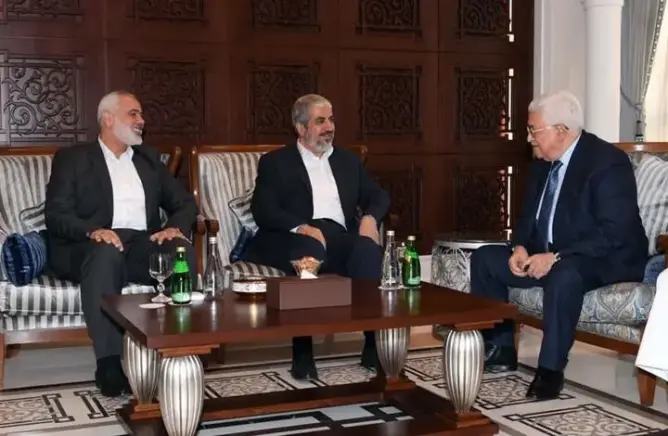 قطر تجمع عباس بمشعل وهنية بالدوحة لإنهاء الانقسام الفلسطيني