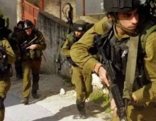 قوات الاحتلال تعتقل 14 فلسطينيا من الضفة الغربية