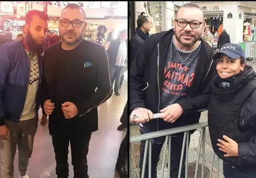 الملك يلتقط صورا مع مغاربة بباريس وصورته مع شرطية تلفت الأنظار (صور)