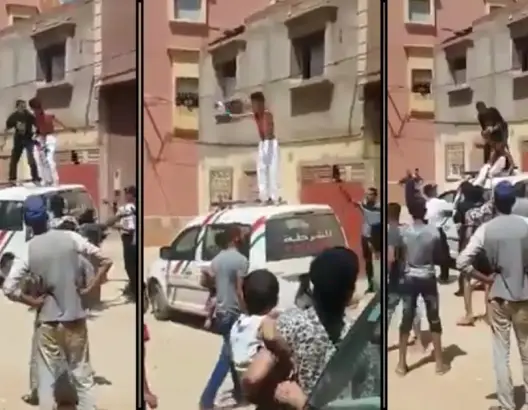 شاهد شاب “محيح” فوق سيارة للأمن