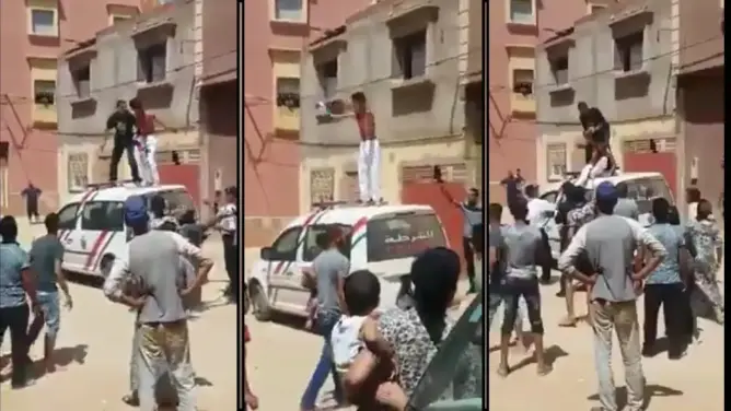 شاهد شاب “محيح” فوق سيارة للأمن