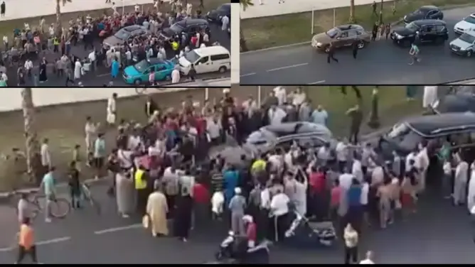 شاهد كيف تجمهر المواطنين حول الملك محمد السادس بعد توقفه بمدينة مرتيل