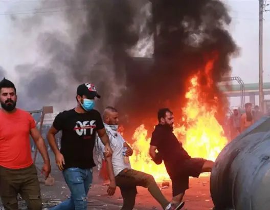 100 قتيل وآلاف الجرحى في احتجاجات عنيفة في العراق