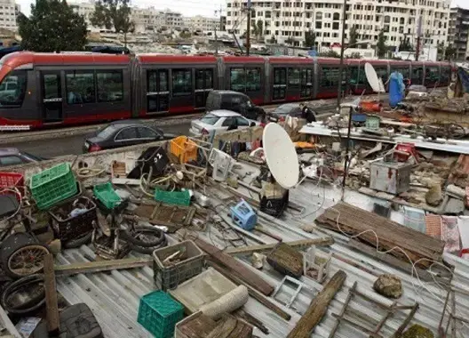 إعفاء المرحلين من دور الصفيح من واجبات التسجيل أثناء شراء العقارات