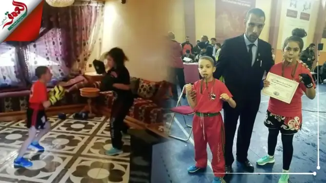 طفلان يحولان “صالة” منزلهما لنادي رياضي يمارسان فيه شغفهما بـ”الفول كونطاكت” (فيديو)