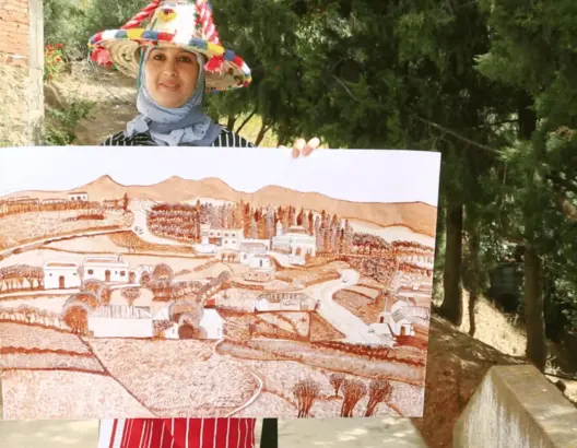 ترسم بماء الزيتون… زهرة من المغرب العميق تبدع  في الفن التشكيلي