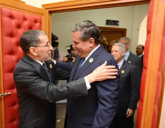 عزيز أخنوش رئيس حزي التجمع الوطني للأحرار / سعد الدين العثماني الأمين العام لحزب العدالة والتنمية