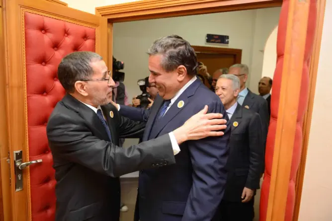 عزيز أخنوش رئيس حزي التجمع الوطني للأحرار / سعد الدين العثماني الأمين العام لحزب العدالة والتنمية