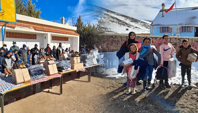 إفران.. جمعويون يوزعون ملابس شتوية على التلاميذ بالمناطق الجبلية(صور)