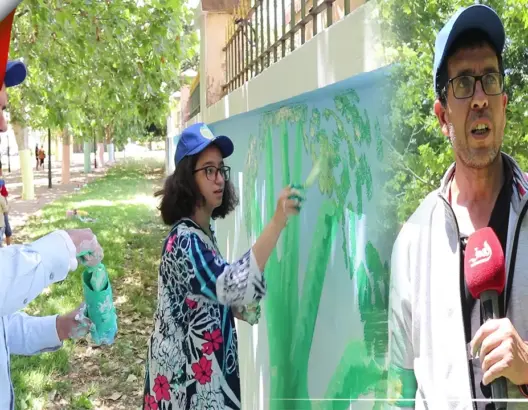 بمناسبة اليوم العالمي للبيئة.. لوحات جدارية فنية تزين ساحة عمان بالحاجب(فيديو)