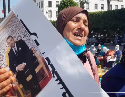 صرخة أرملة عسكري مهددة إفراغ منزلها تناشد الملك (فيديو)