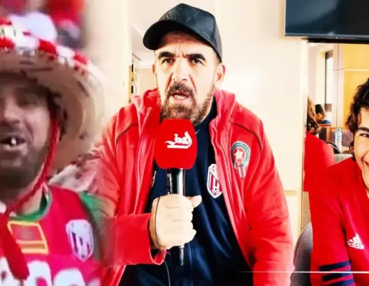 مشجع تطواني لفت الأنظار رفقة ابنه في مونديال قطر