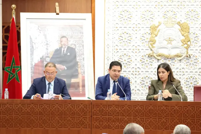 الحكومة: اتفاقية “تبادل المعلومات” تهم الضرائب وليس منازل وأراضي الجالية
