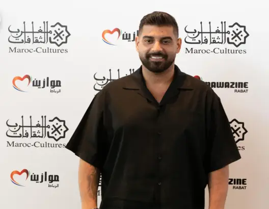 آدم يتحدث عن غنائه باللهجة المغربية